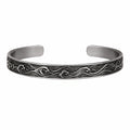 Bracciale rigido aperto con motivo onde incise in argento